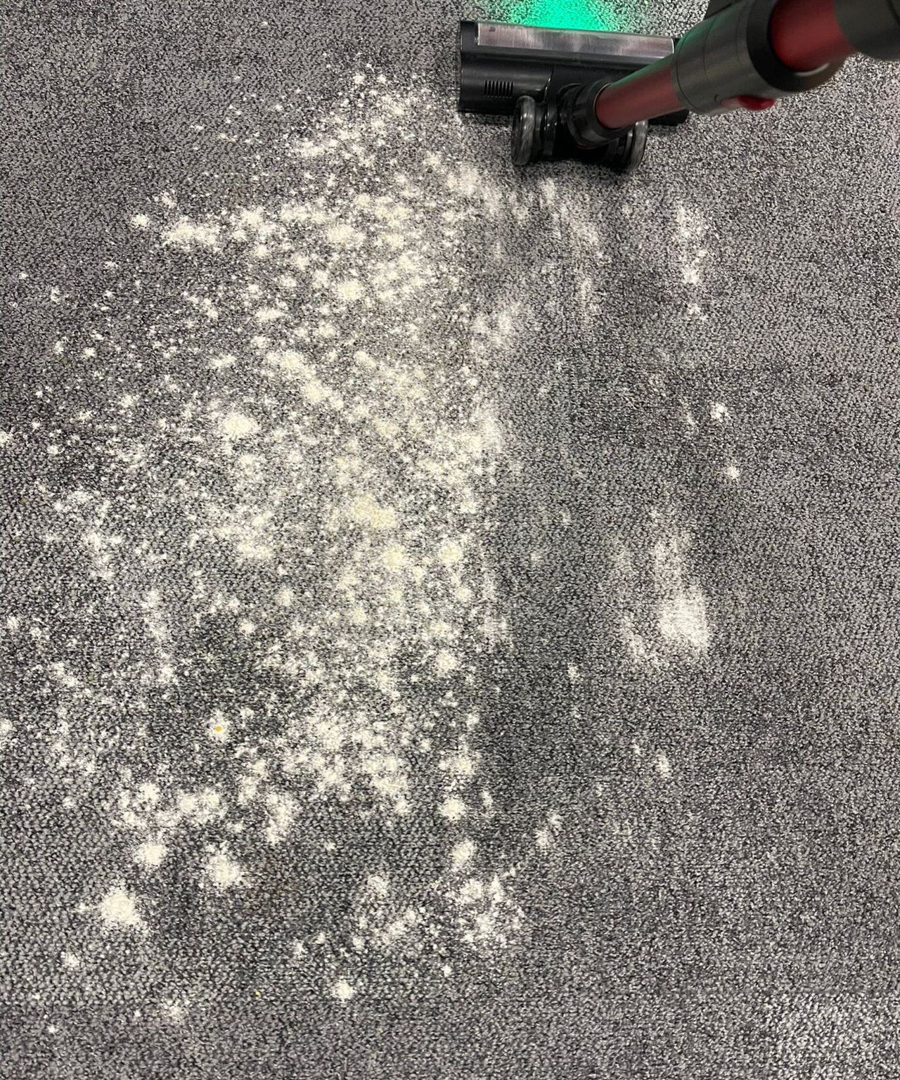Ultenic U16 Flex vacuuming flour and sugar on carpet in Future test center