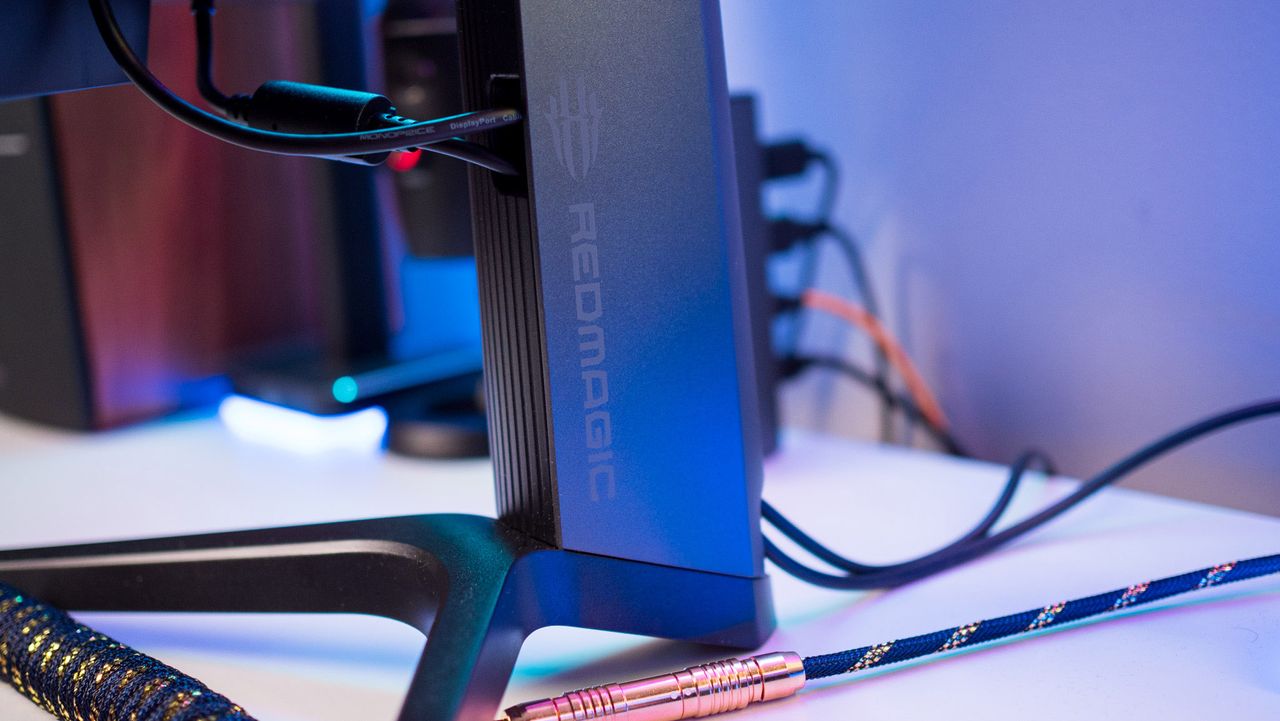 Stand of the Redmagic 4K Gaming Monitor on a white table