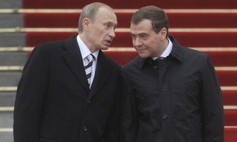 Russia&amp;#039;s President Dmitry Medvedev (right) and Prime Minister Vladimir Putin (left)