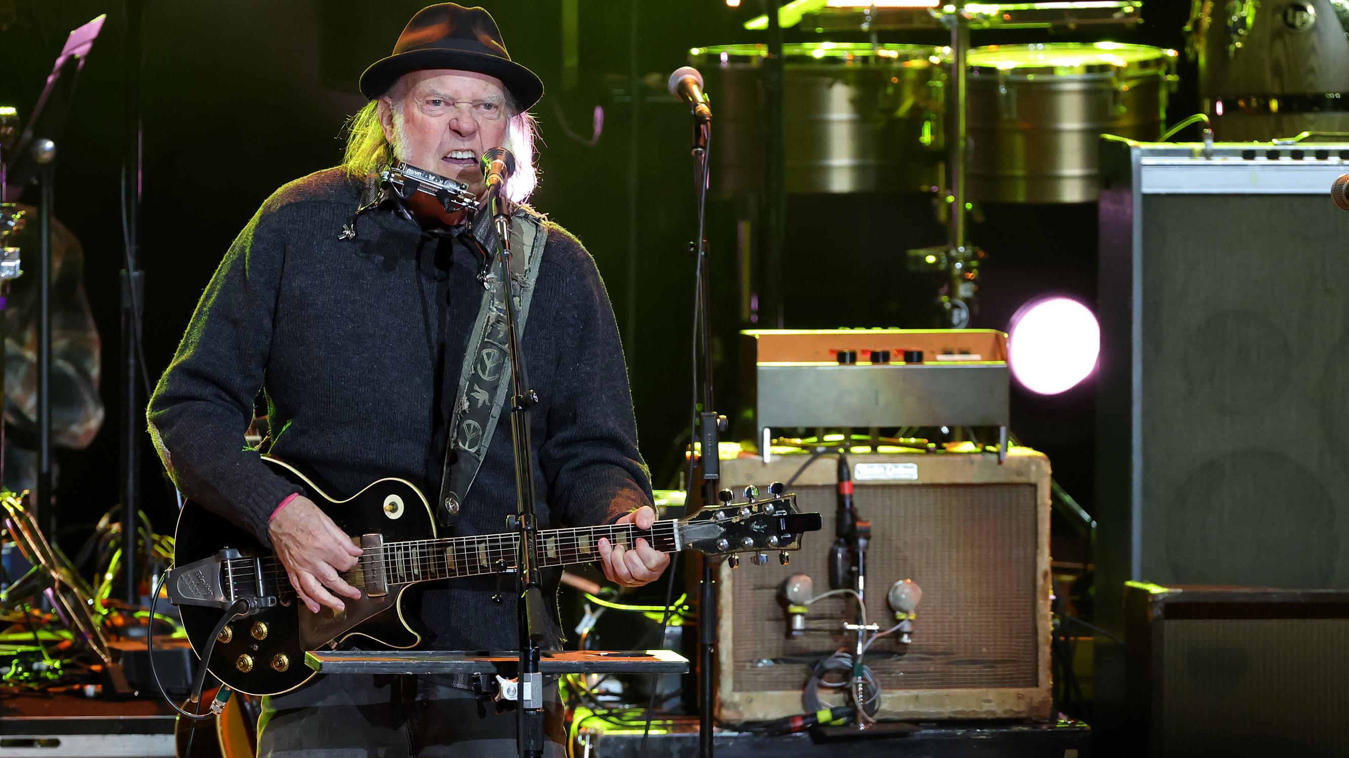 Neil Young performs onstage during the Light Up The Blues 7 Concert celebrating Autism Speaks' 20th Anniversary at the Greek Theatre on April 26, 2025 in Los Angeles, California.