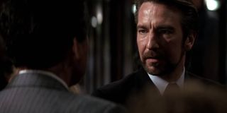 Alan Rickman as Hans Gruber meeting James Shigeta as Joseph Takagi in Die Hard