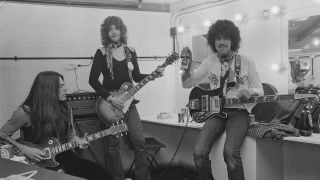 Thin Lizzy backstage in 1974: L-R Scott Gorham, Brian Robertson, Phil Lynott