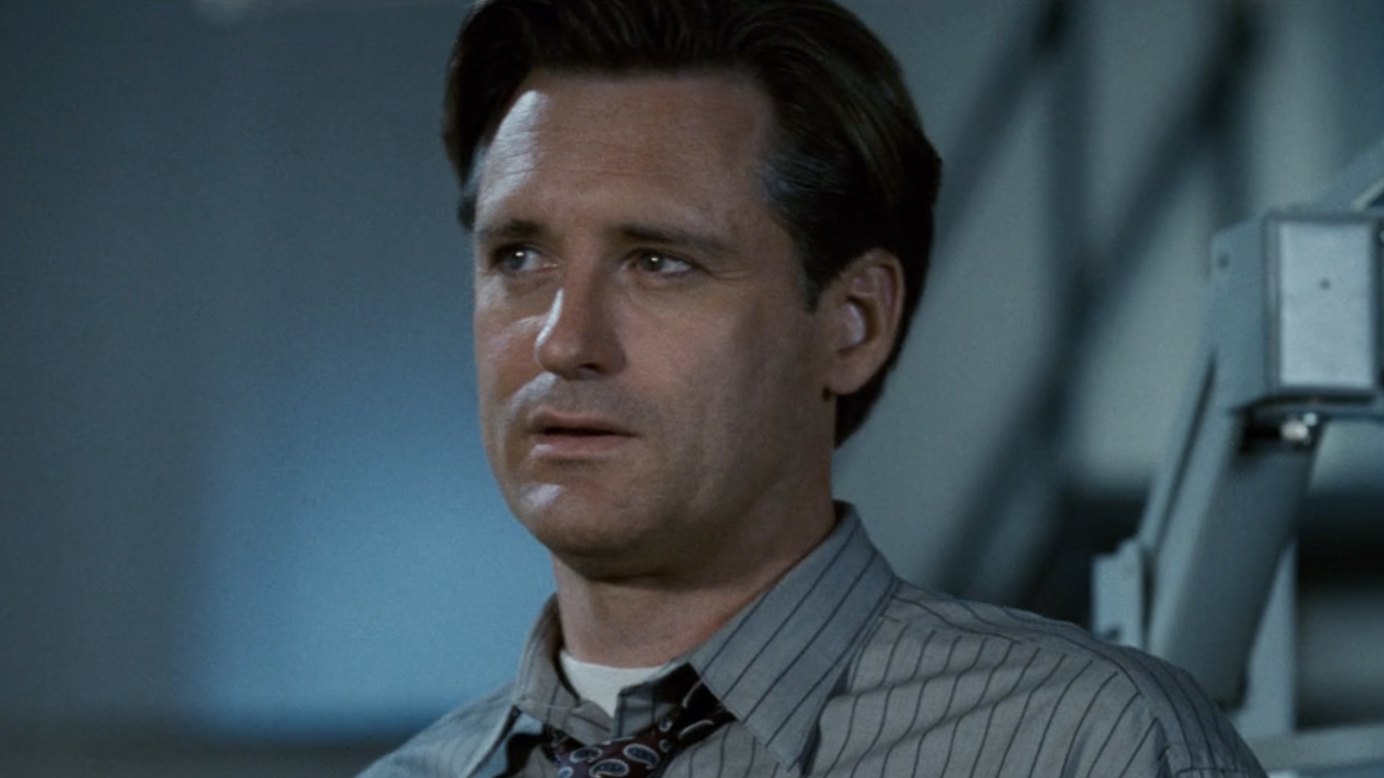 Bill Pullman looking concerned in Independence Day.