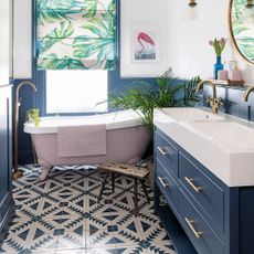 bathroom with bathtub and wash basin