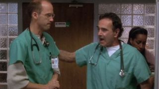 Anthony Edwards talking to Dan Hedaya in ER