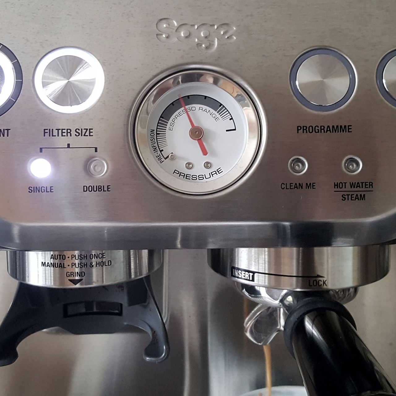 A close up of the Sage Barista Express coffee machine