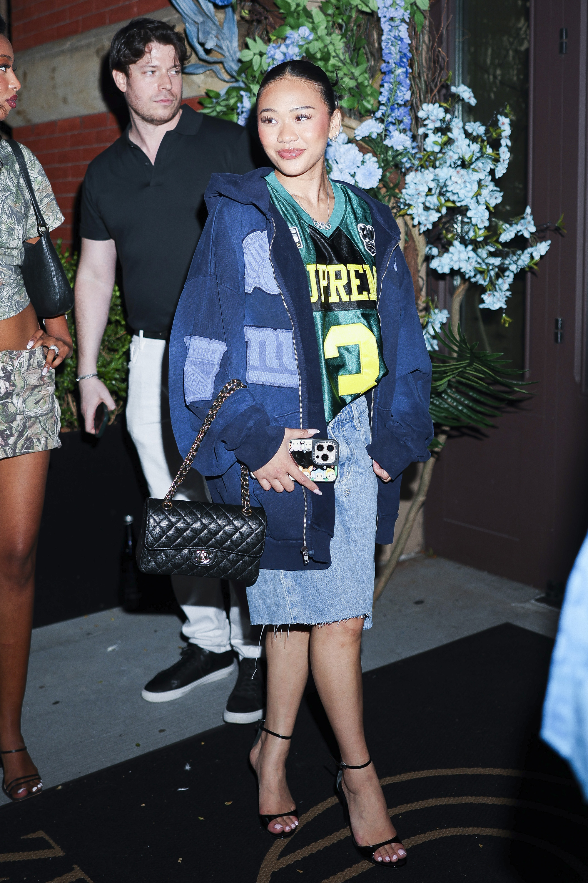 Suni Lee styled a sports jersey in June 2025