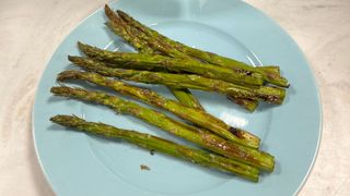 The results of the asparagus test, a plate of perfectly-roasted asparagus