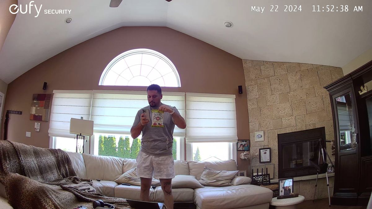 Eufy S350 captures man holding popcorn