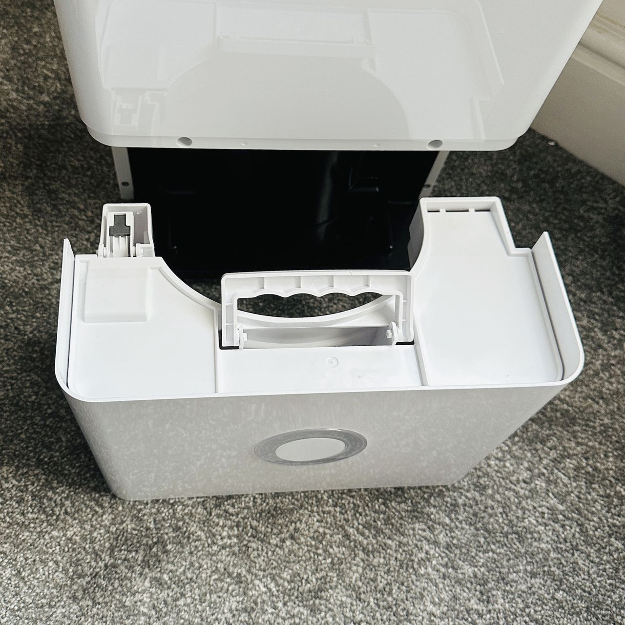 The Pro Breeze 30L High Capacity Smart Dehumidifier review being tested in a room with grey carpet