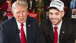 Donald Trump looks into the camera on a stream with Adin Ross, who is wearing a white &quot;Make America great again&quot; cap.