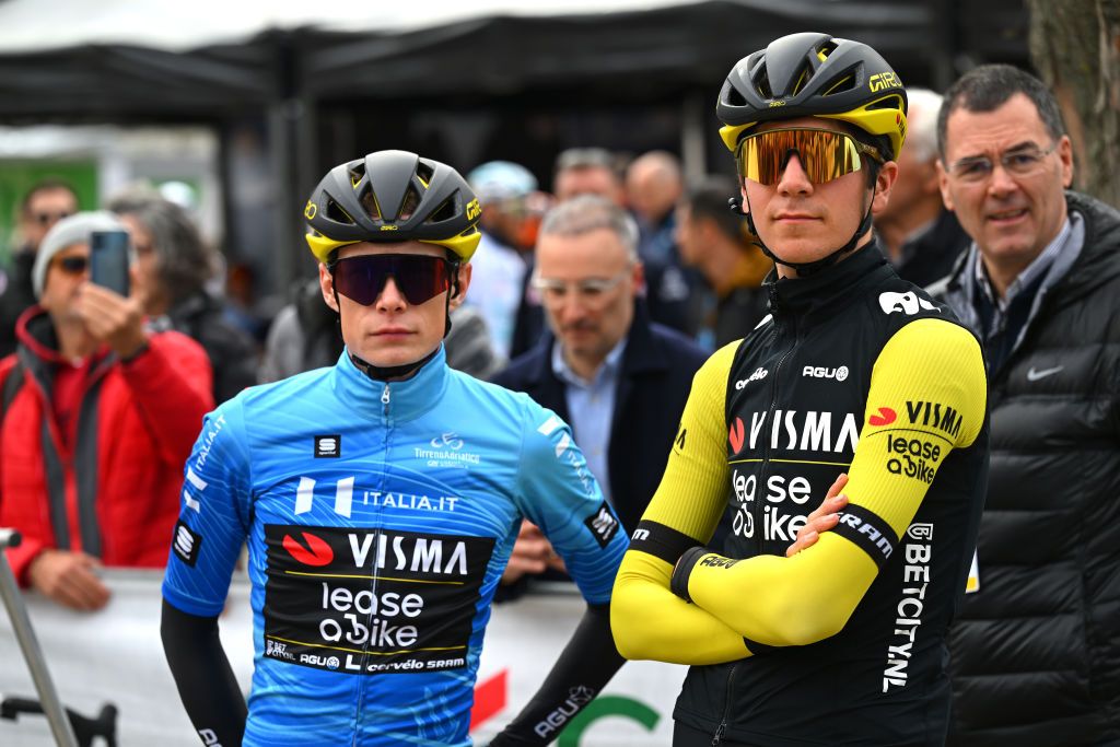 Race leader Jonas Vingegaard waits for the stage start with his Visma-Lease A Bike teammate Cian Uijtdebroeks