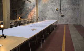 long table with black table lamps