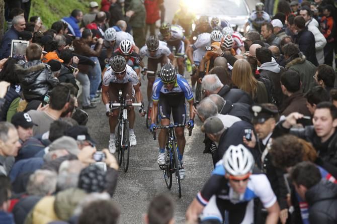 The racers on a steep climb