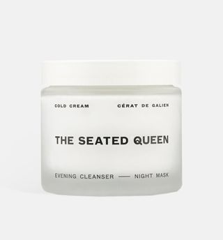 The Seated Queen cold cream in white container with black text