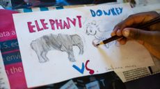 A 4th grader works on an election-themed art project at Heather Hills Elementary School in Bowie, Md., on Tuesday, October 22, 2024