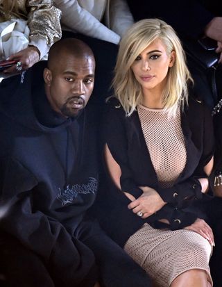 Kanye West And Kim Kardashian Front Row At Paris Fashion Week AW15