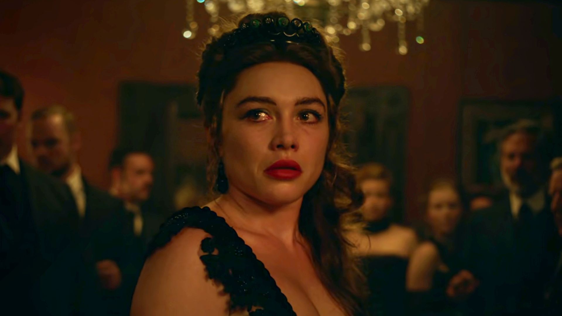 Florence Pugh in a black dress and hair up as Cathy Ames in East of Eden (2026).