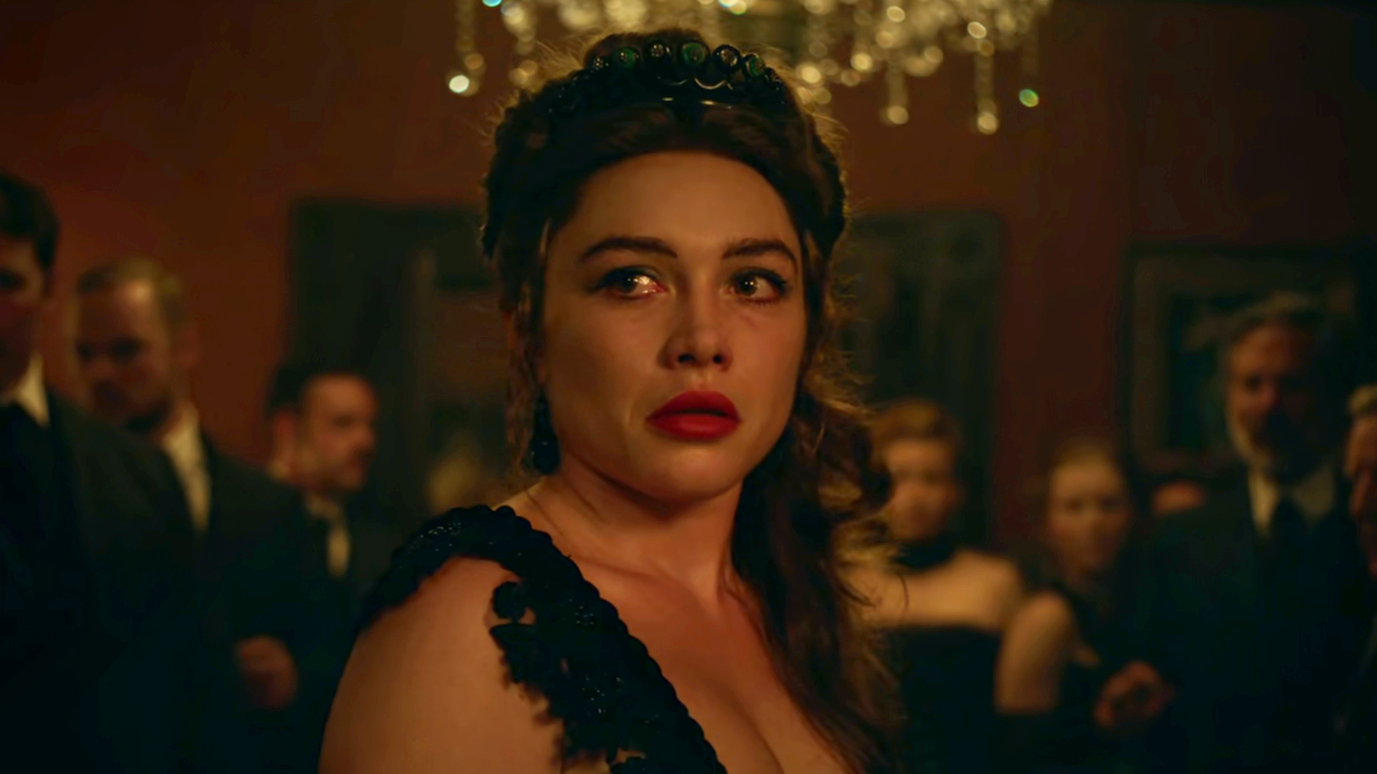 Florence Pugh in a black dress and hair up as Cathy Ames in East of Eden (2026).