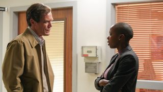 Michael Shannon as Gary Noesner and Sasheer Zamata as Angie Graham in Waco: The Aftermath