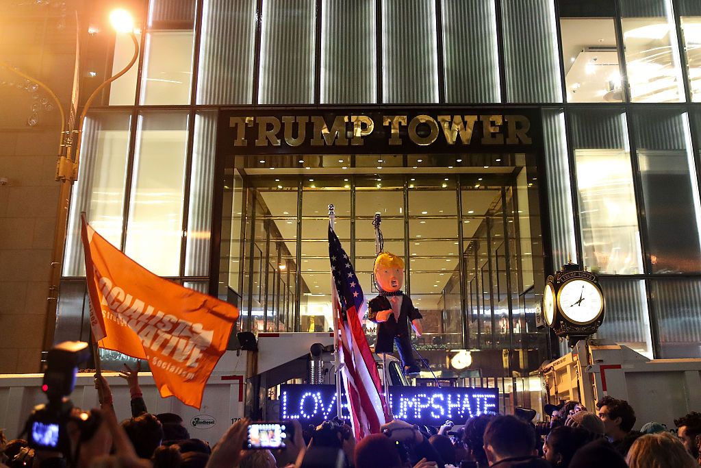  Hundreds of protestors rallying against Donald Trump gather outside of Trump Tower in November 2016.