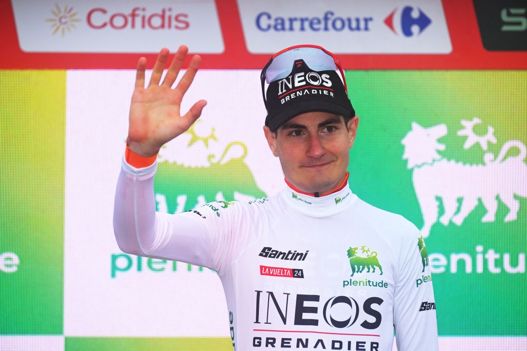 LAGOS DE COVADONGA SPAIN SEPTEMBER 03 Carlos Rodriguez of Spain and Team INEOS Grenadiers celebrates at podium as White Best Young Rider Jersey winner during the La Vuelta 79th Tour of Spain 2024 Stage 16 a 1815km stage Luanco to Lagos de Covadonga 1069m UCIWT on September 03 2024 in Lagos de Covadonga Spain Photo by Tim de WaeleGetty Images