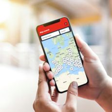 Person holding phone with Jet2 destinations on a map