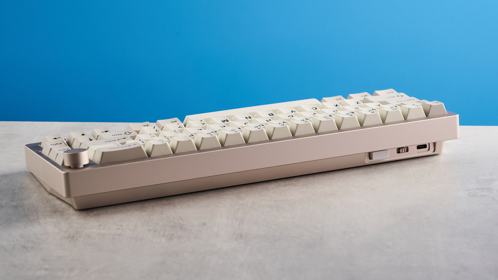A khaki Epomaker P65 mechanical keyboard with linear switches