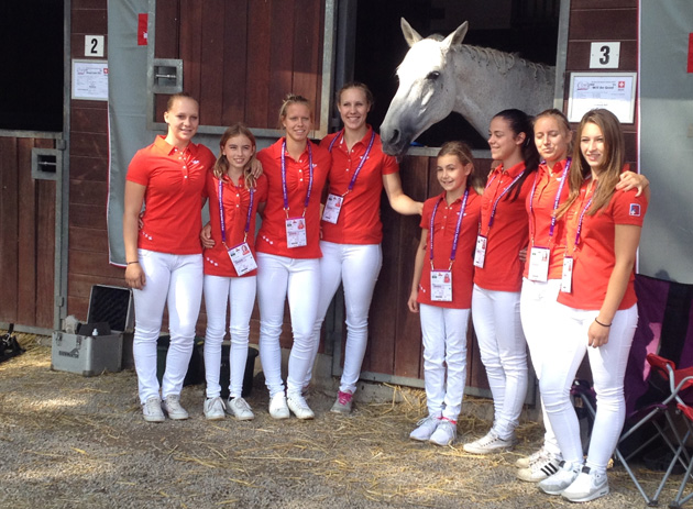 The Swiss vaulting team at Aachen 2015, including their 11-year-old flyer