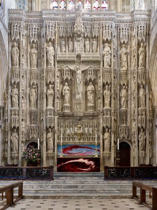 The High Altar (Great Screen) at Winchester Cathedral: The high altar reredos, probably begun in the 1440s and restored in 1885–91, which originally featured a gold and silver retable and naturalistic sculpture of superlative quality.