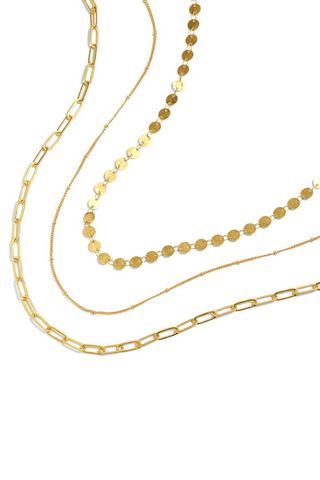 three assorted yellow gold chains