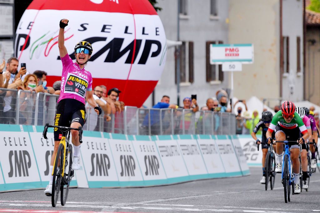 PUEGNAGO DEL GARDA ITALY JULY 08 Marianne Vos of Netherlands and Jumbo Visma Team Purple Points Jersey stage winner celebrates at arrival Elisa Longo Borghini of Italy and Team Trek Segafredo during the 32nd Giro dItalia Internazionale Femminile 2021 Stage 7 a 1096km stage from Soprazocco di Gavardo to Puegnago Del Garda 219m GiroDonne UCIWWT on July 08 2021 in Puegnago del Garda Italy Photo by Luc ClaessenGetty Images