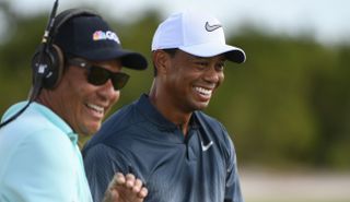 Begay and Tiger laugh and smile