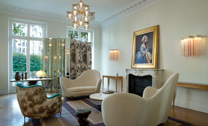 Decorative lounge area with large sofas &amp; artwork