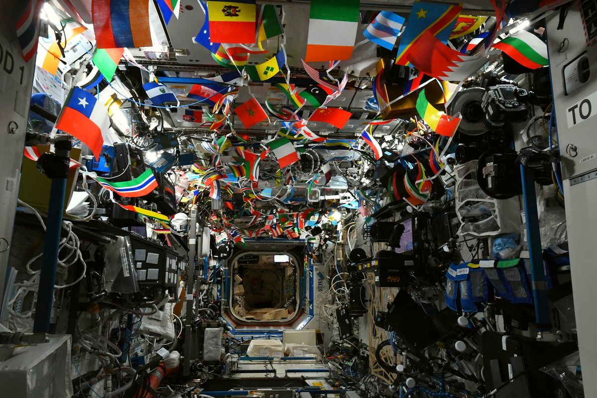 Flags of many nations at the Olympics in the International Space Station