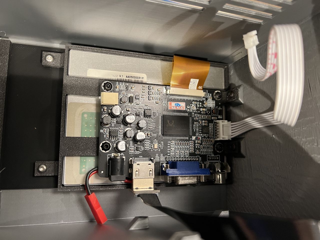 Inside, showing Raspberry Pi mount and connections