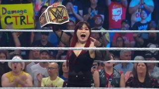 Iyo Sky celebrating her WWE Women's Championship victory