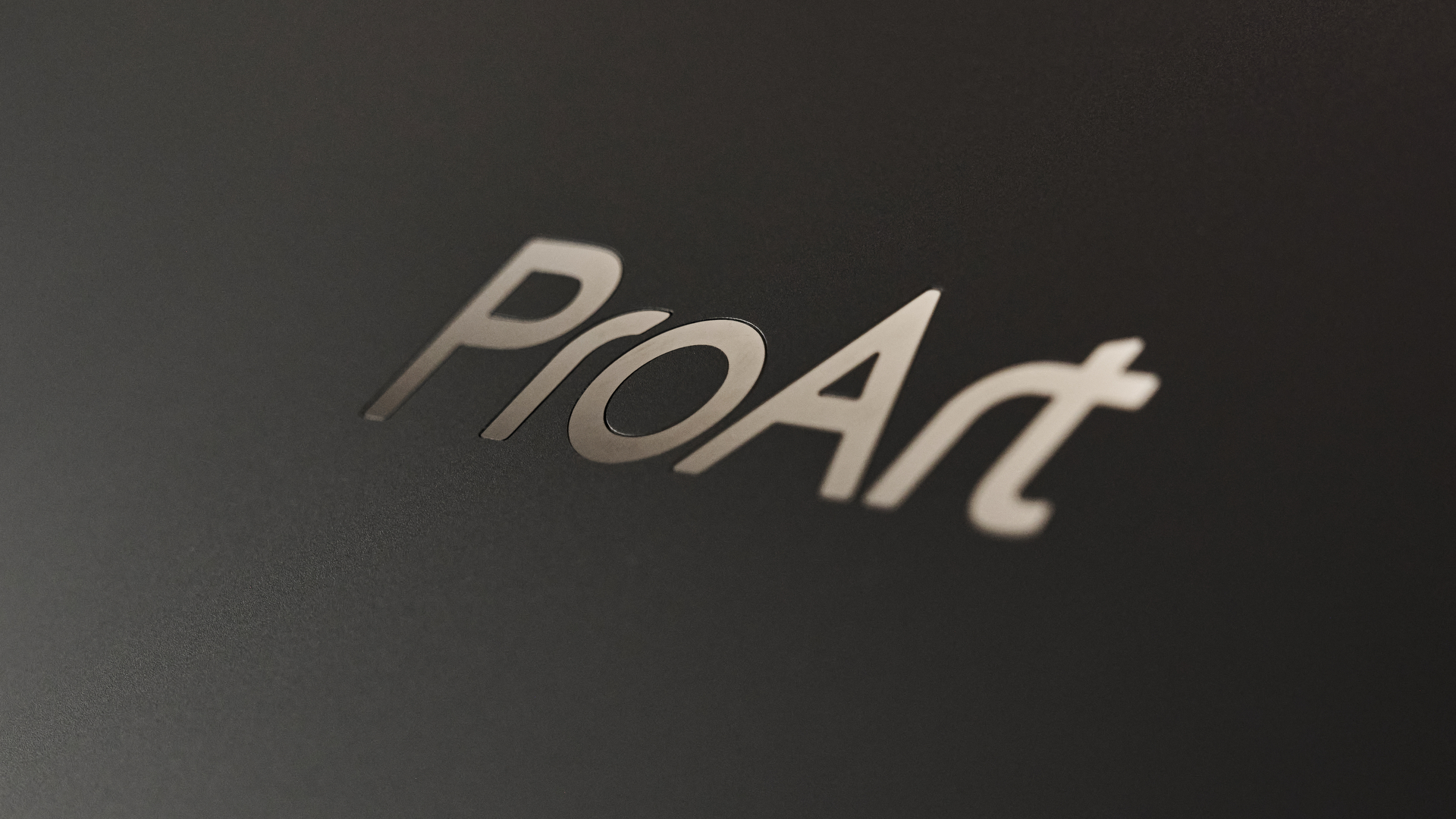 A closeup of the Asus ProArt logo on the rear of the ProArt P16 RTX Spark.