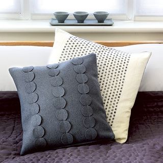 Give your bed hotel style with crisp white bed linen, a quilted throw and our stylish statement cushion