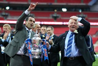 Dave Whelan, right, and former Wigan manager Roberto Martinez celebrate winning the FA Cup in 2013