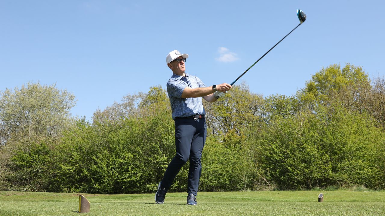 Golfer watches their drive