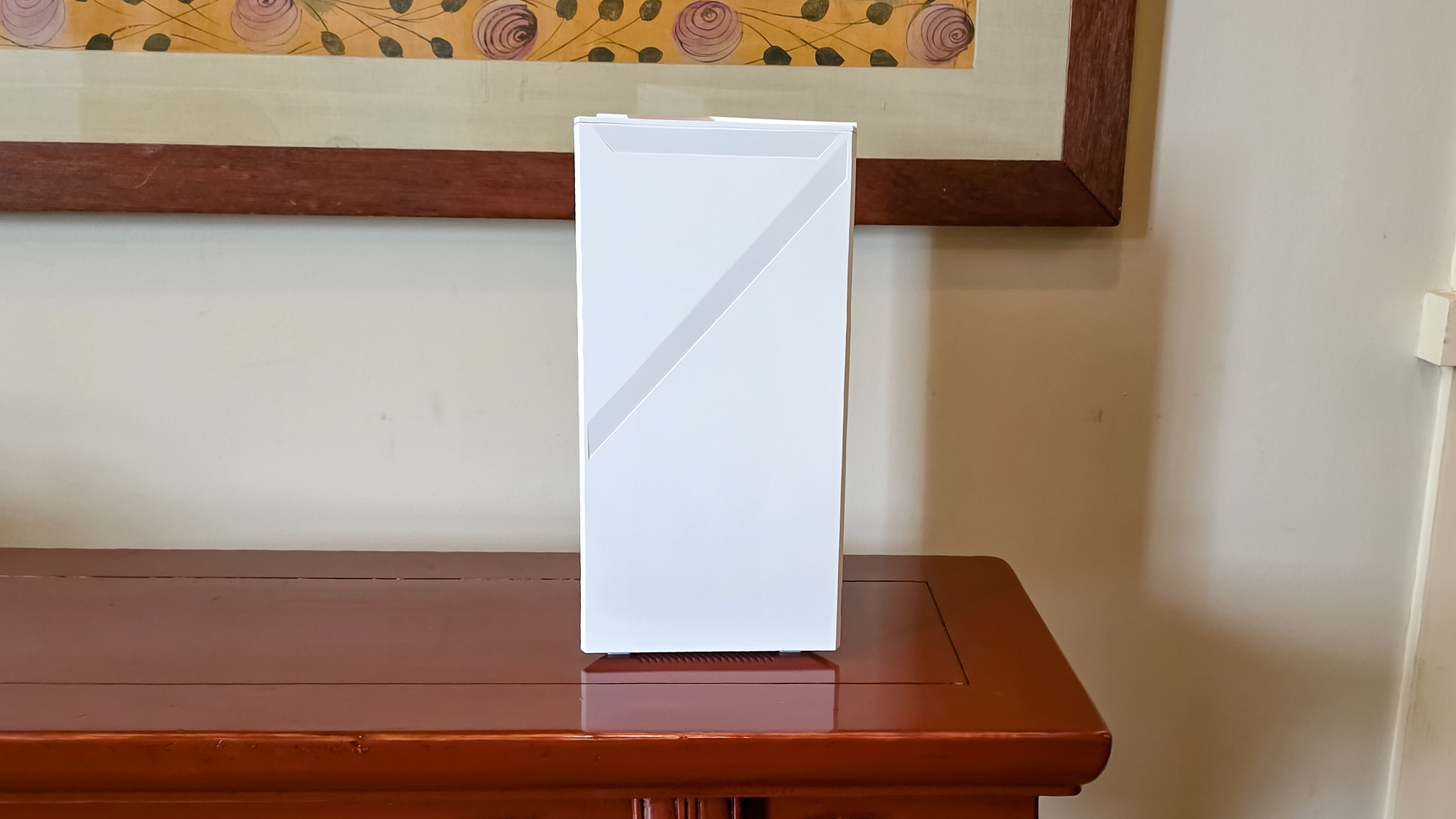 MSI Roamii BE Pro router on a side table