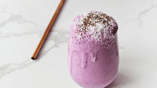 The Protein Power Smoothie served in a glass cup on table