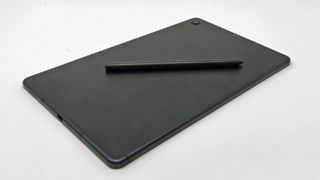 The Samsung Galaxy Tab S6 Lite laying down with its stylus.