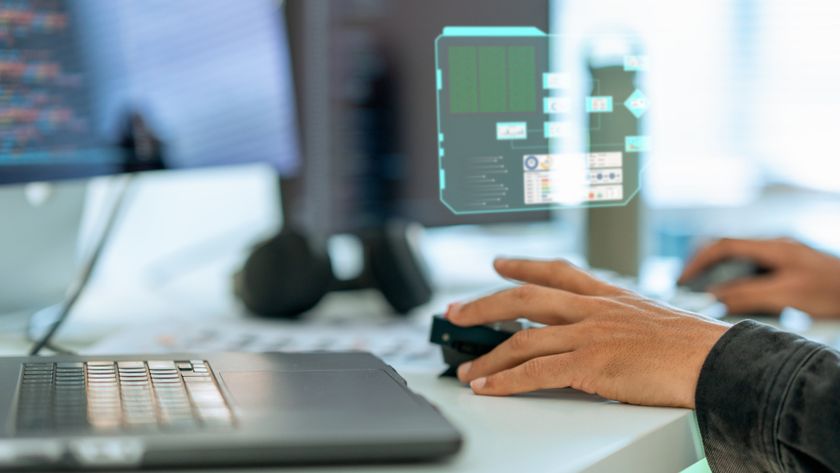 person using an AI PC to code