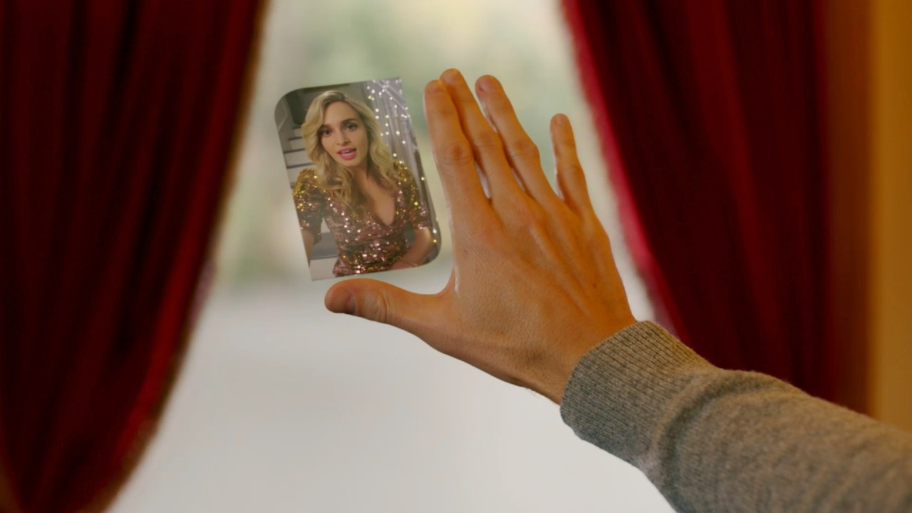 Allegra Edwards in video phone form on Upload.