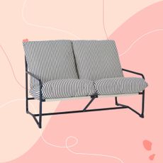 Navy striped Marcy outdoor sofa on pink garphic background