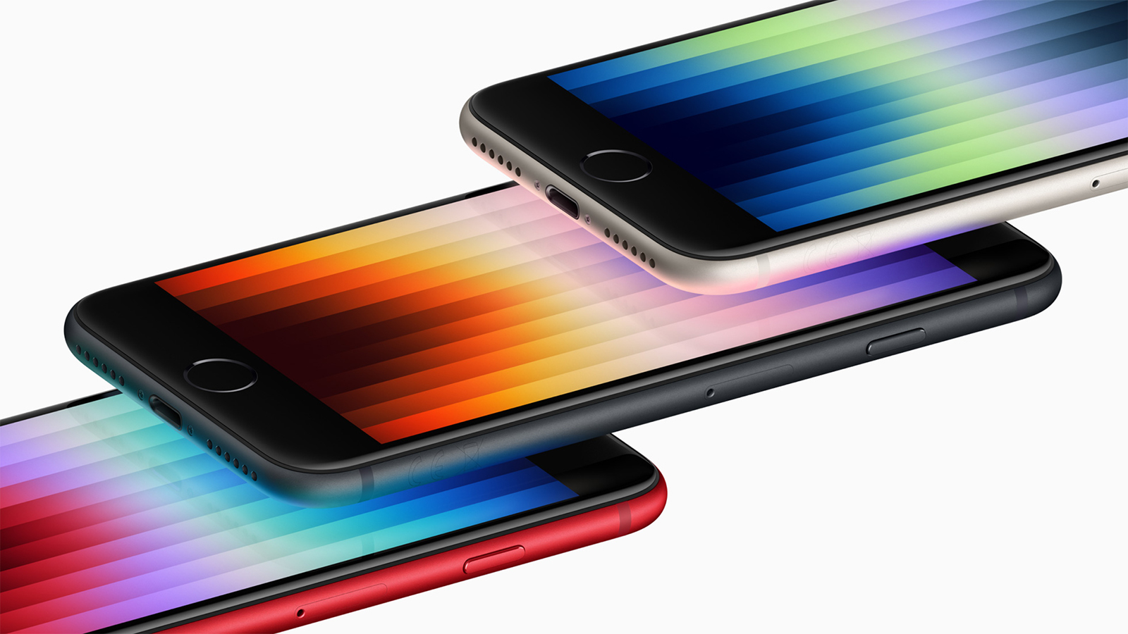 Tre iPhone SE 2022-telefoner stablet oven på hinanden.