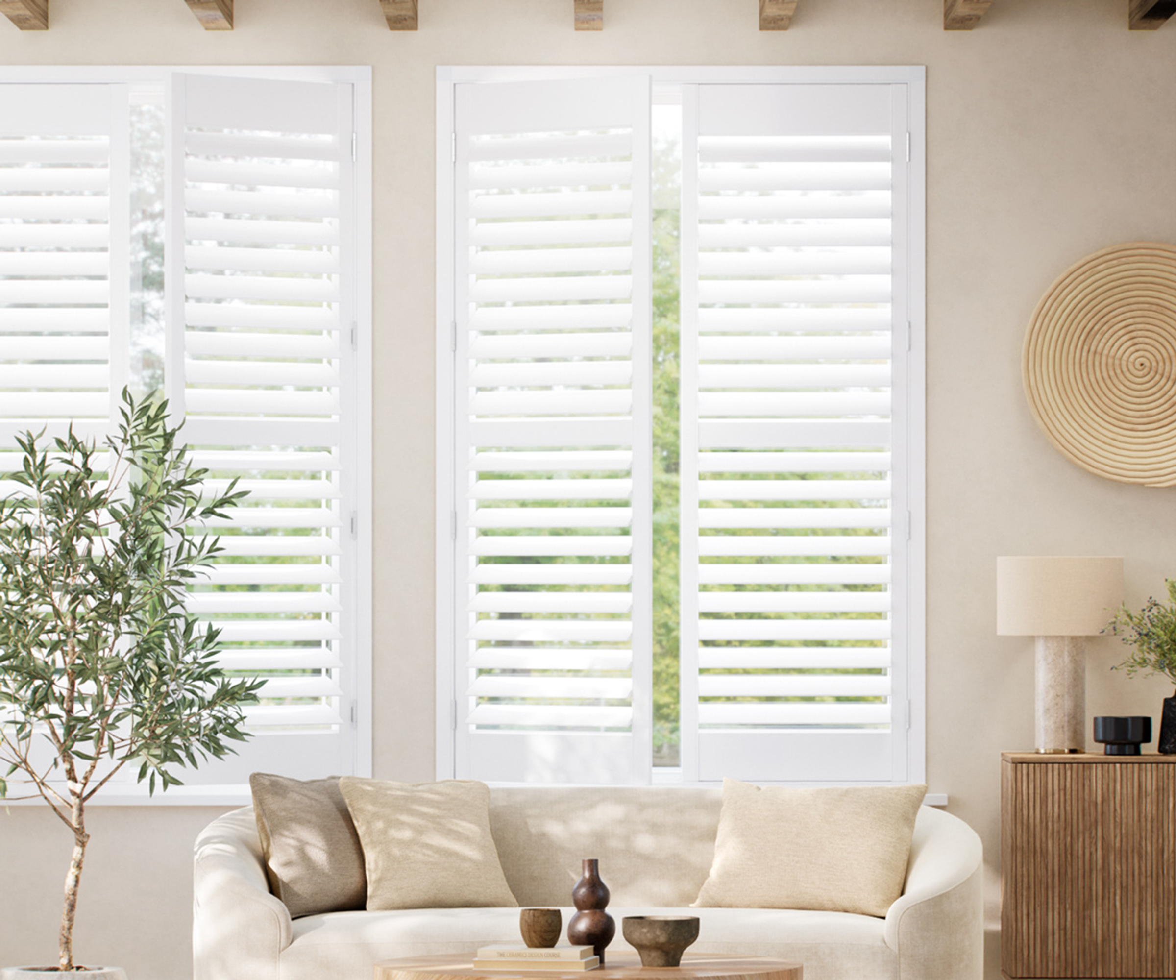 neutral living room with white window shutters