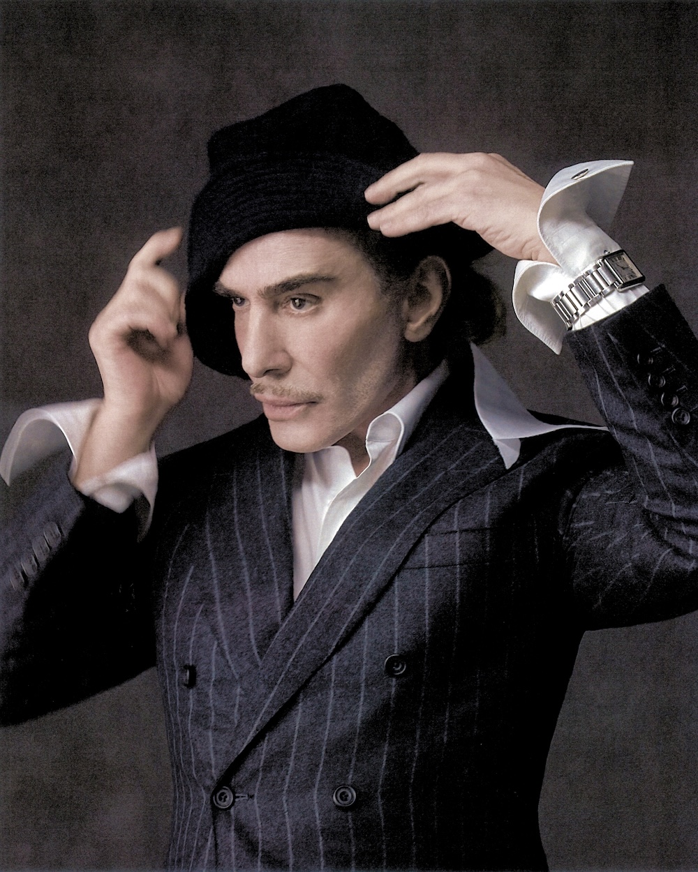John Galliano in a press image for his Zara partnership